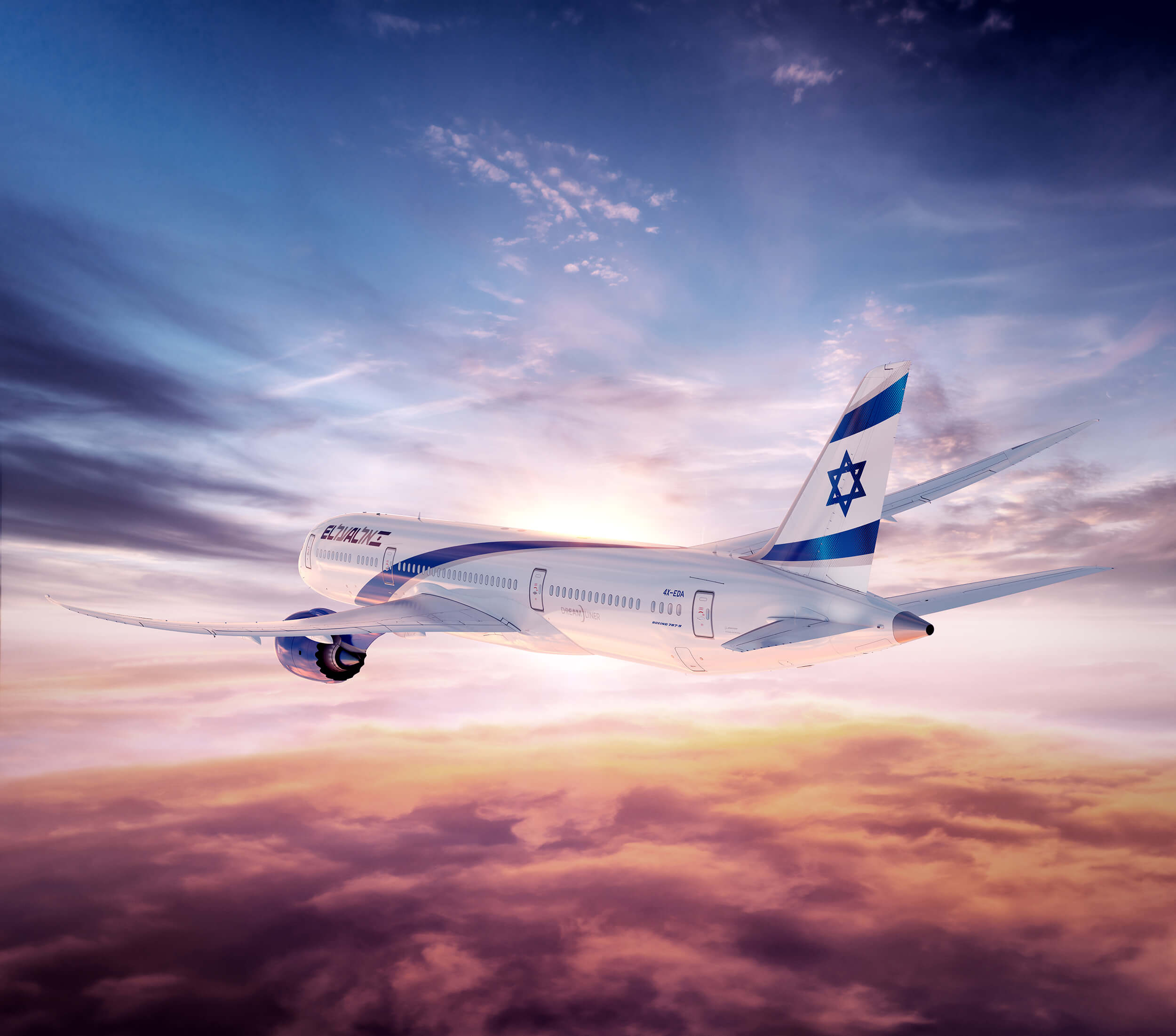 El al aircraft flying above clouds