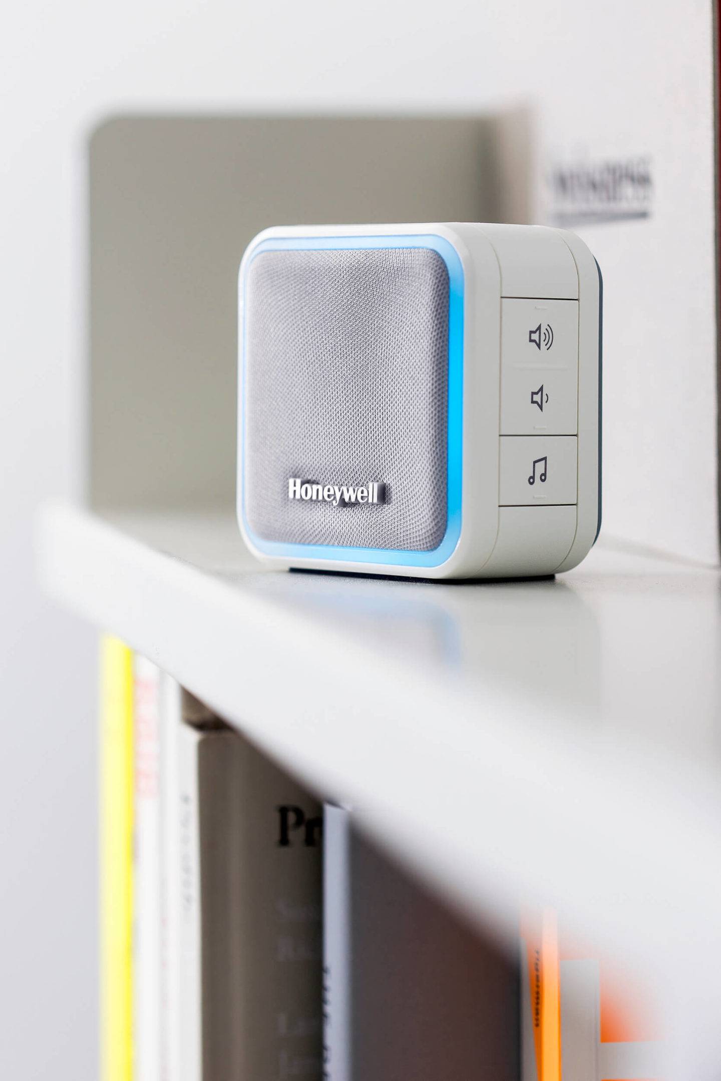 Door bell with illuminated rim on a shelf