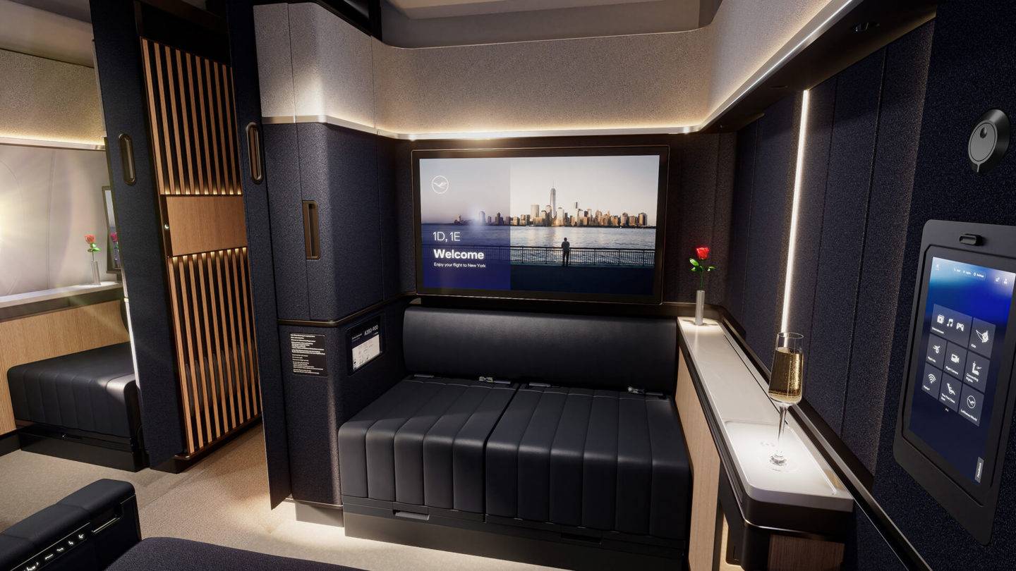 Forward facing view aboard the Lufthansa A350 First Class suite with the sliding doors open