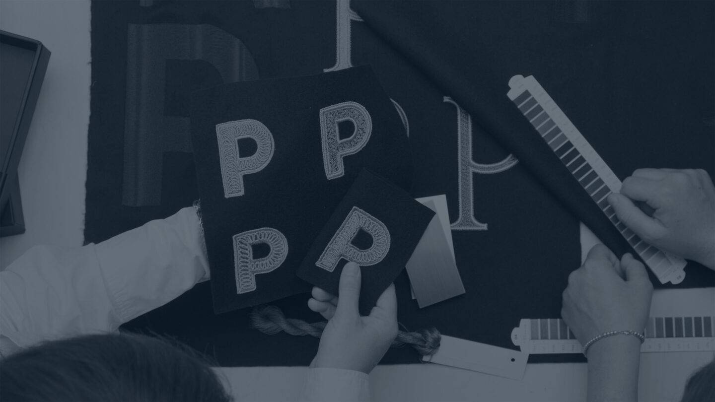 laying out Private Studio Embroidery swatches