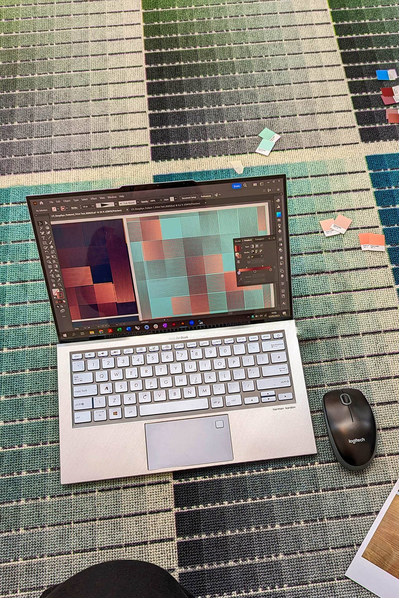 On screen design of the carpet shown alongside physical carpet