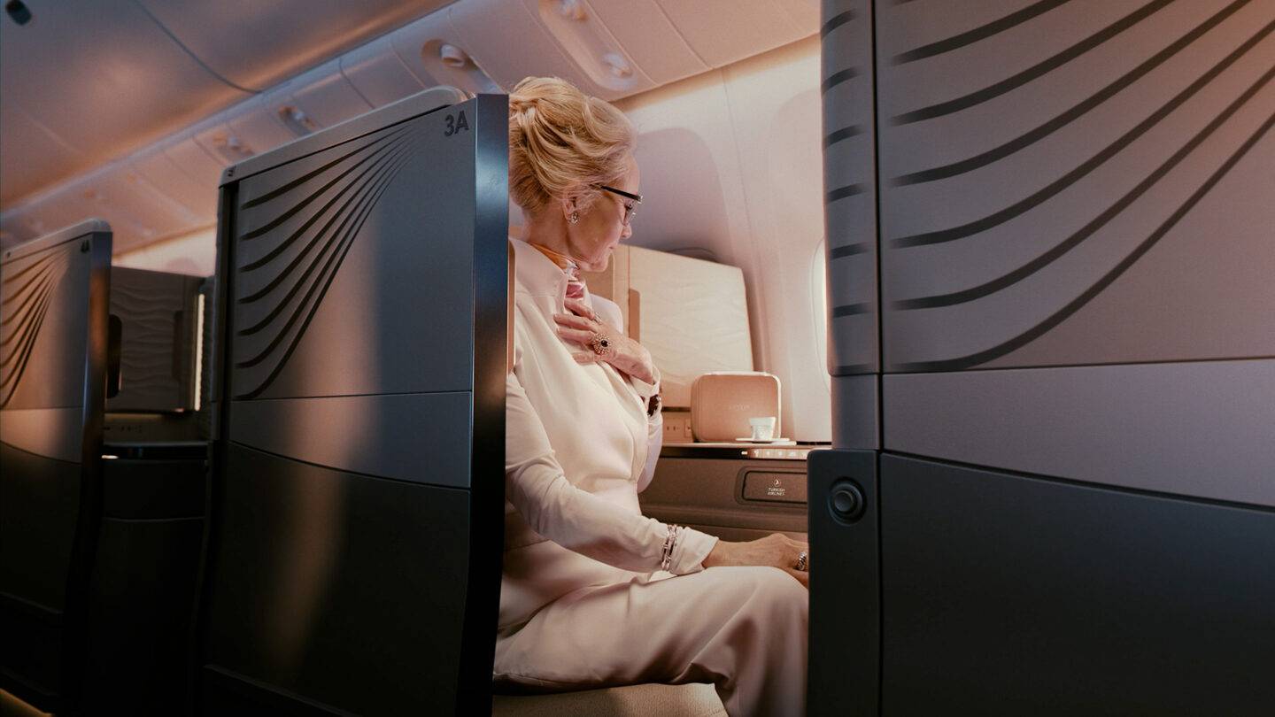 Lady sitting in Turkish Airlines Business Class Seat
