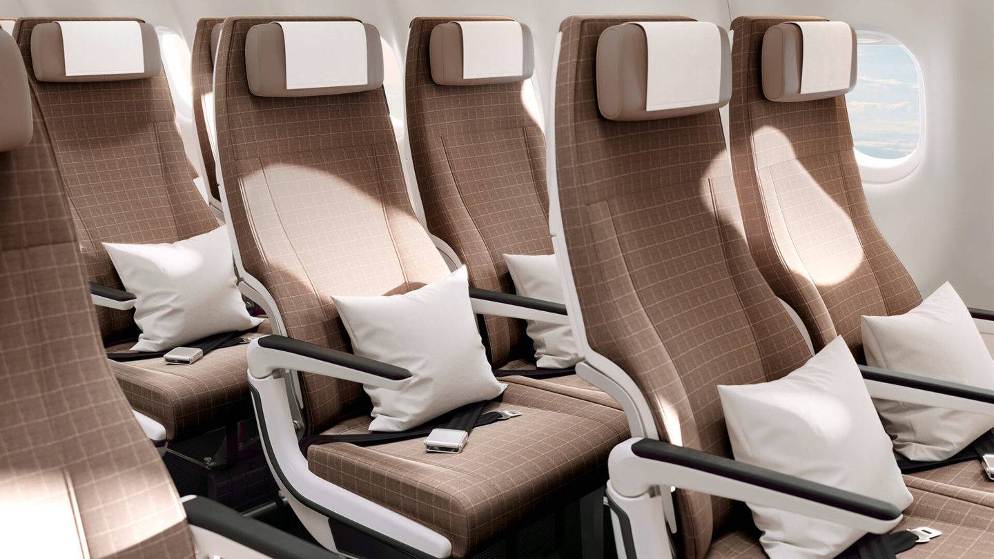 SWISS Economy seating aisle view showing 2 seats per row and cushions on each seat